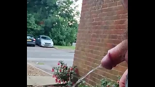 Chubby Gay Guy taking a risky piss outside